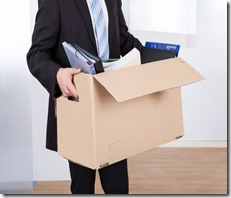 Businessman Moving Out With Cardboard Box